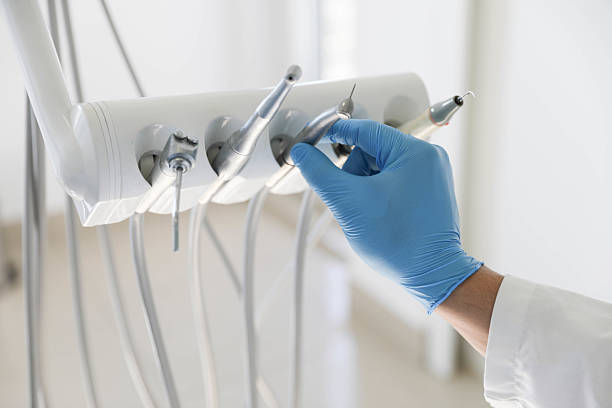 Professional Root Canal Treatment technician working in Denmark, WI